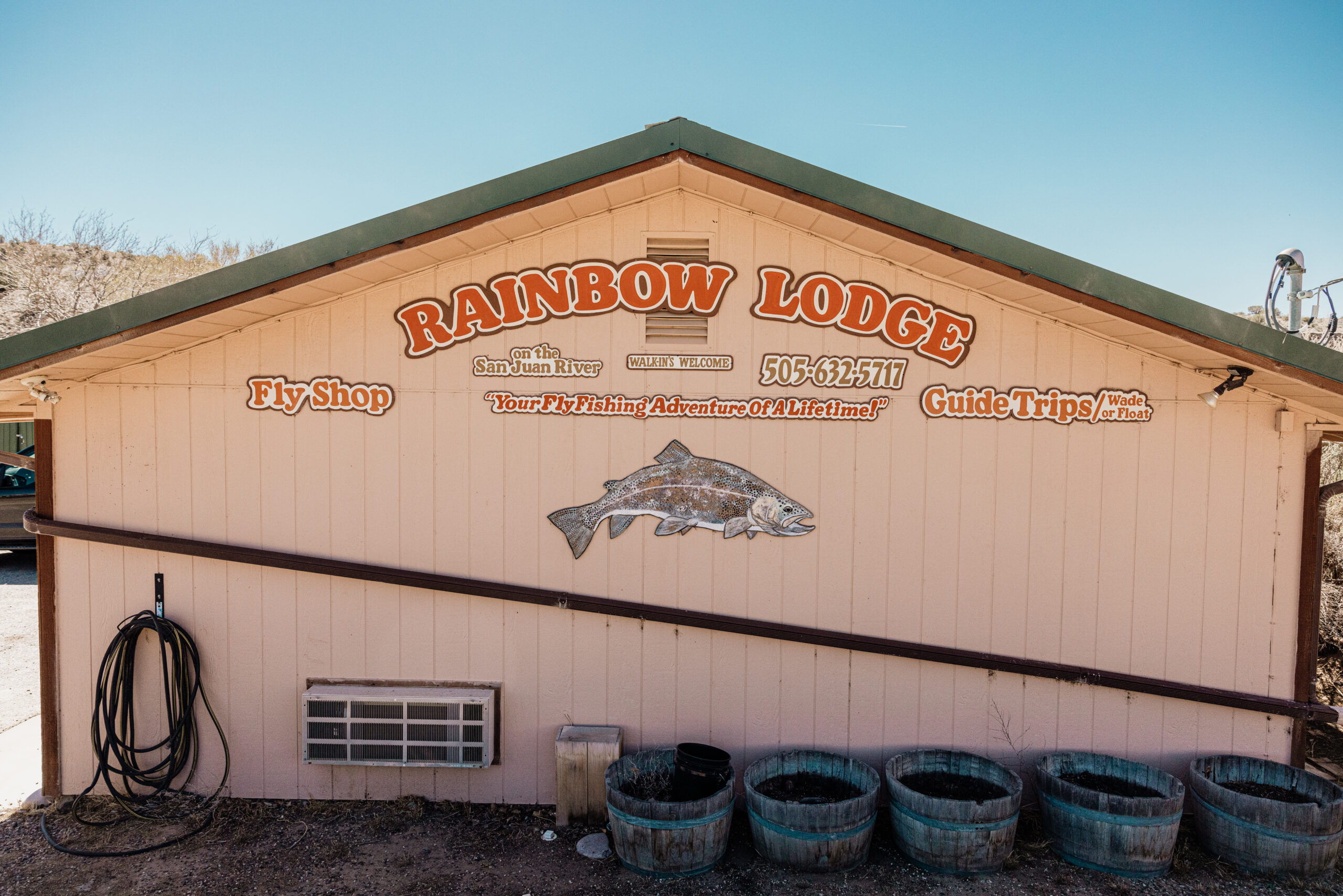 Rainbow Lodge general contact details posted in an office.